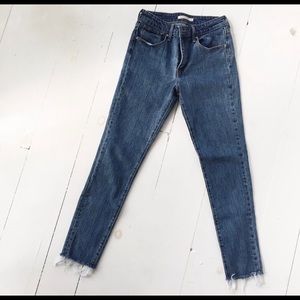 Levi’s 721 high rise skinny jeans raw hem